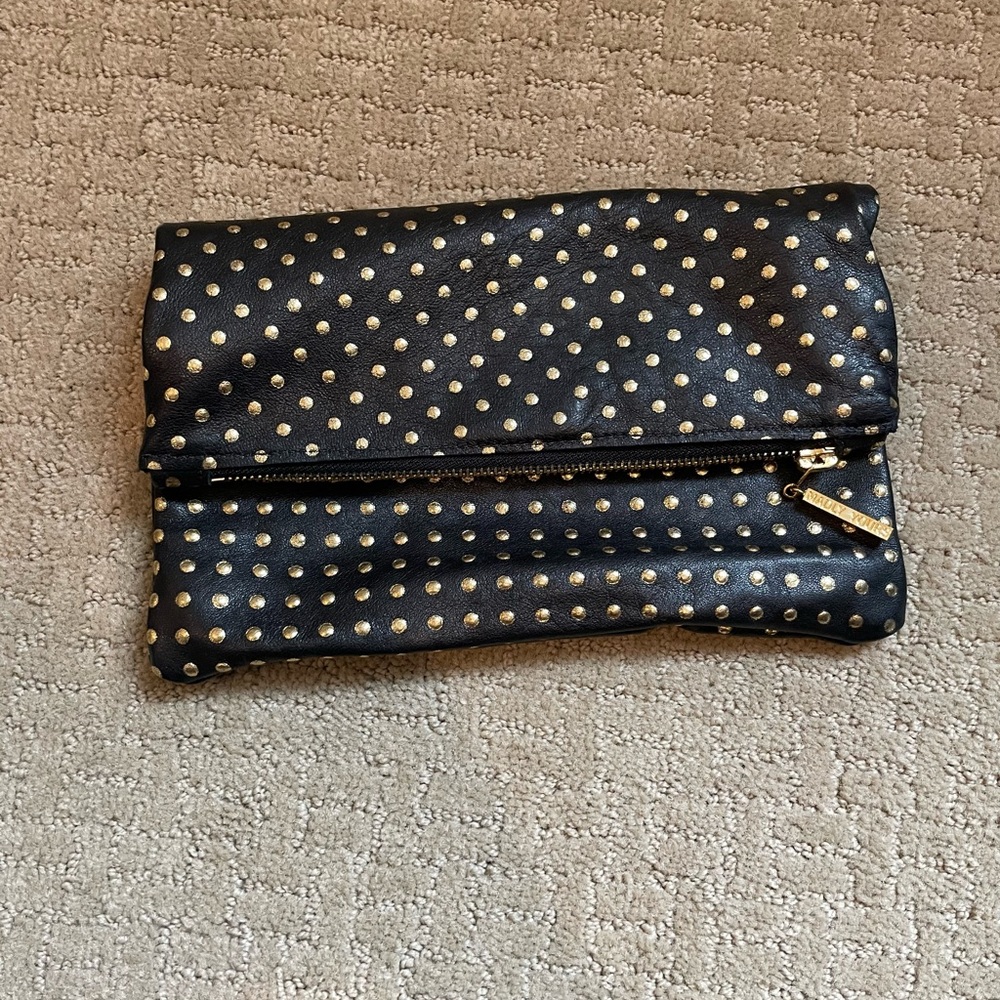 Madly Yours black and gold leather clutch with gold zipper